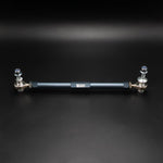 Suspension Secrets adjustable front drop link, full length view on a dark background - Suspension Secrets Thumbnail