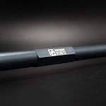 Suspension Secrets front drop link, close-up of the anodised hex body and engraved logo - Suspension Secrets Thumbnail