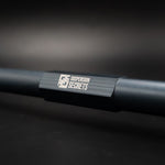 Suspension Secrets drop link, close-up of the engraved logo on the grey hex adjuster - Suspension Secrets Thumbnail