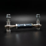 Suspension Secrets rear drop link, side view of the body and rod ends on a black background - Suspension Secrets Thumbnail