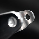 Suspension Secrets front camber block, close-up of the mounting tab and bolt hole - Suspension Secrets Thumbnail