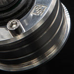 Suspension Secrets front control arm bush, close-up of the machined housing and engraved logo - Suspension Secrets Thumbnail