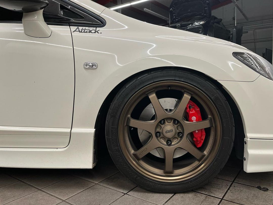 Honda Civic Type R FD2 front wheel with red caliper and Paragon front rotor