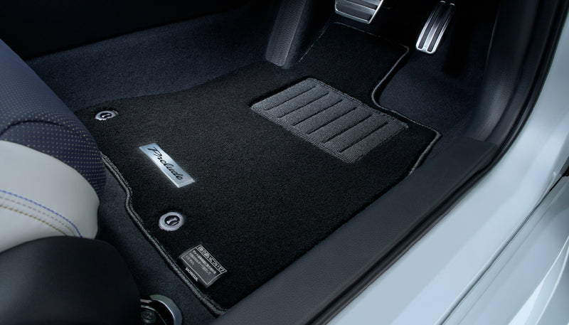 Black Honda Access premium floor mat with heel pad in the driver's footwell of a Prelude BF1 - Honda - Genuine