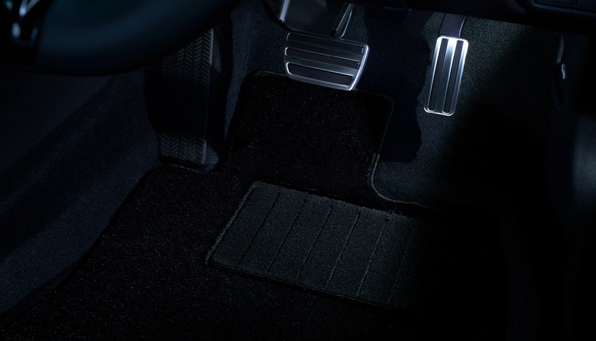 White LED foot light glowing in the driver's footwell of a Honda Prelude BF1