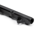 ACUITY K-series fuel rail, Honda K-series, satin black – close-up of the gauge port and mounting tab - Acuity Thumbnail