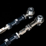 Suspension Secrets third link arms, close-up of the adjusters and rod ends on a dark background - Suspension Secrets Thumbnail