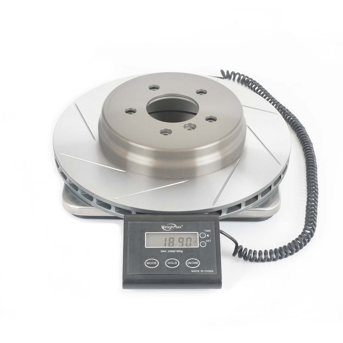 Paragon 345 x 24mm BMW rear rotor on scale showing 18.9 lb weight