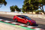 Red Tesla Model 3 on a race track - Paragon Thumbnail