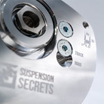 Suspension Secrets top nut in a camber plate, beside the Track and Road adjuster bolts - Suspension Secrets Thumbnail
