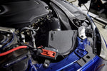 MST heat shield cover with MST logo fitted next to the headlight in an Audi B9 engine bay - MST Performance Thumbnail