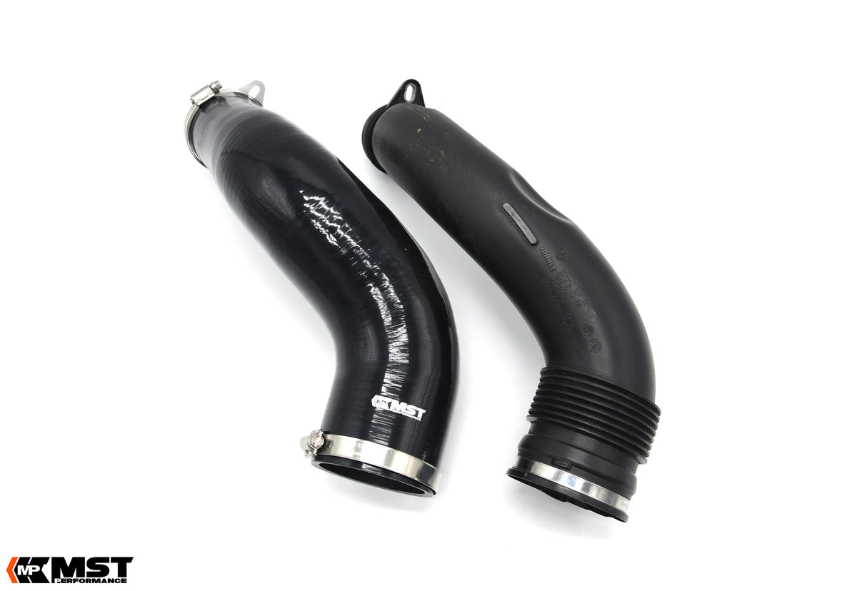 MST silicone turbo inlet pipe next to the factory BMW N55 corrugated plastic pipe