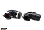 MST turbo inlet pipe next to the factory inlet, comparing the adapter ends - MST Performance Thumbnail