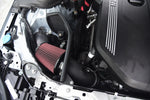 MST red cone filter and heat shield fitted beside the B58 engine cover in a BMW G-series - MST Performance Thumbnail