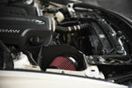 MST red cone filter in the heat shield behind the headlight of a white BMW F30 - MST Performance Thumbnail