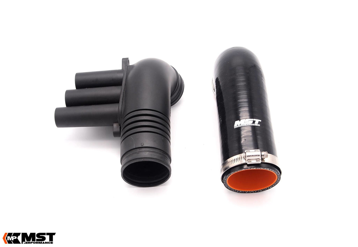 MST silicone turbo inlet hose next to the factory corrugated rubber hose
