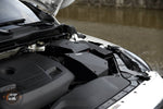 MST cold air intake installed beside the engine in a Volvo V40, side view with cover on - MST Performance Thumbnail