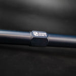 Suspension Secrets tie rod end, logo on the adjuster body against a dark background - Suspension Secrets Thumbnail