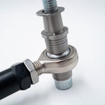 Suspension Secrets tie rod end, detailed view of the Fluro rod end and height shims - Suspension Secrets Thumbnail