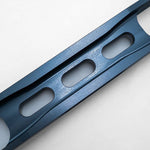 Suspension Secrets traction arm, close-up of the machined lightening slots - Suspension Secrets Thumbnail