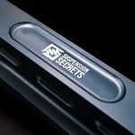 Suspension Secrets traction arm, close-up of the engraved logo panel - Suspension Secrets Thumbnail
