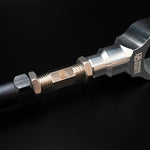 Suspension Secrets traction arm, close-up of the engraved stainless adjuster and lock nuts - Suspension Secrets Thumbnail